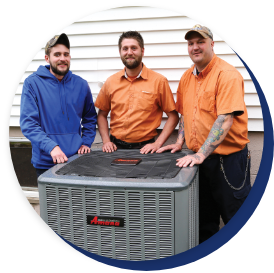 Amana workers standing behind Amana HVAC unit